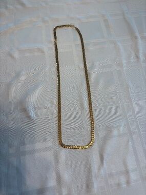 Monet brand gold costume jewelry chain. 36 inches long.